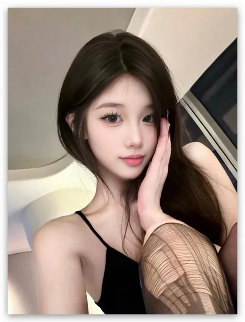七七